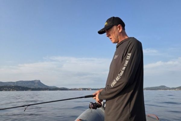 Why is it important to use a technical t-shirt when fishing?